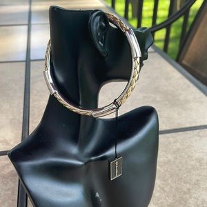 8 inch/20 cm braided gold tone bracelet with silver tone accents never worn